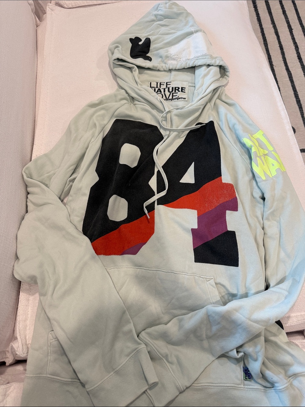 freecity Mint Green Hoodie with Bold 84 Graphic and Neon Accent